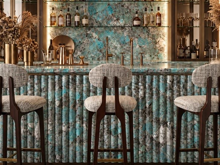 Luxury bar counter featuring Amazonite Quartzite countertops, backsplash and fluted stone panels
