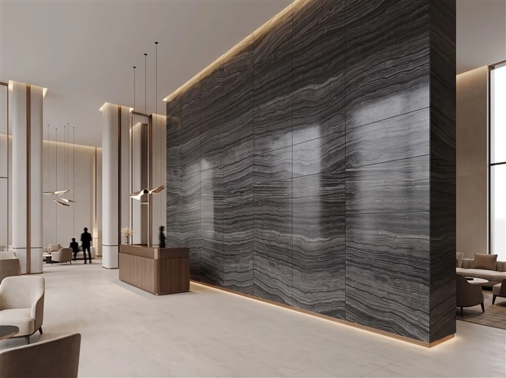Large-format Zebra Black marble wall tiles with visible joints in a luxury hotel lobby