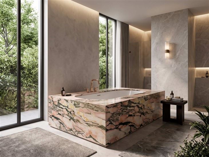 Calacatta Viola Rosa Marble bathtub deck and surround with mitered corners and bold pink, black and golden veining in a modern luxury bathroom