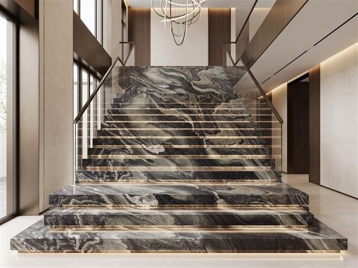 Cipollino Ondulato marble interior staircase with vein-matched treads and risers in a luxury villa