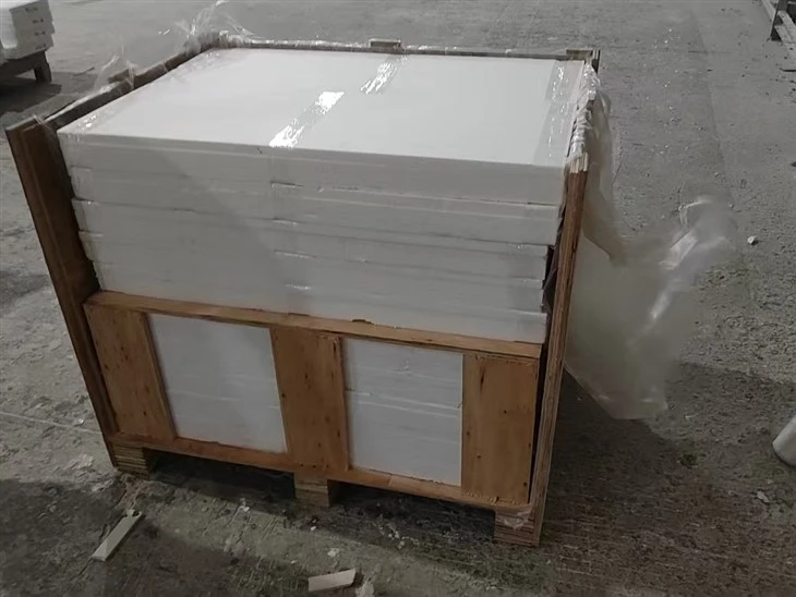 Custom foam-packed long fluted tiles supported with plywood inner protection before crating
