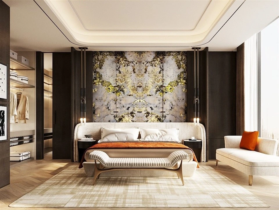 Bookmatched Alpinus Quartzite feature wall with LED backlighting behind a bed in a luxury bedroom interior