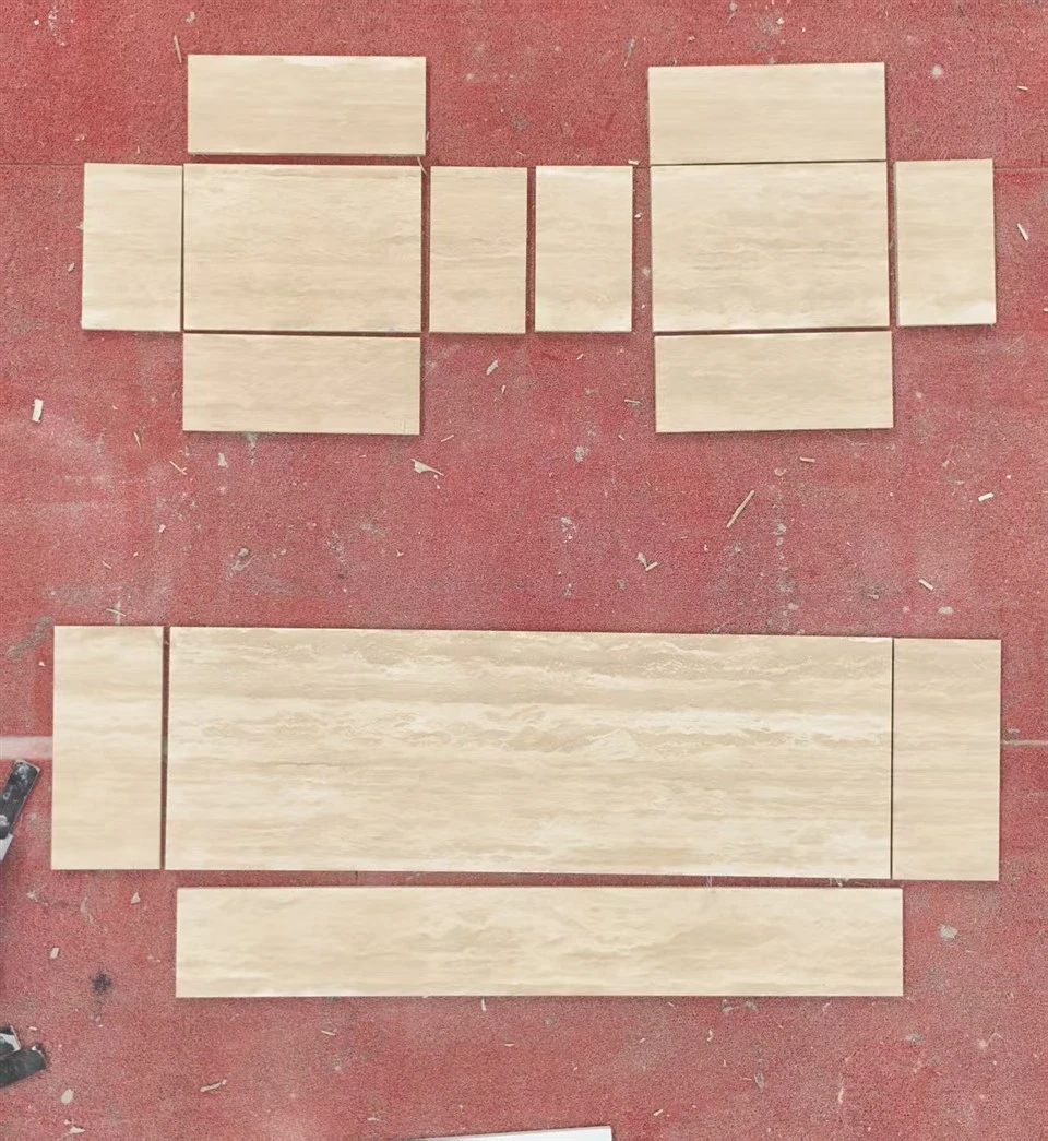Cut Classic Beige Travertine components arranged at the factory to verify dimensions, orientation, and visual relationships.