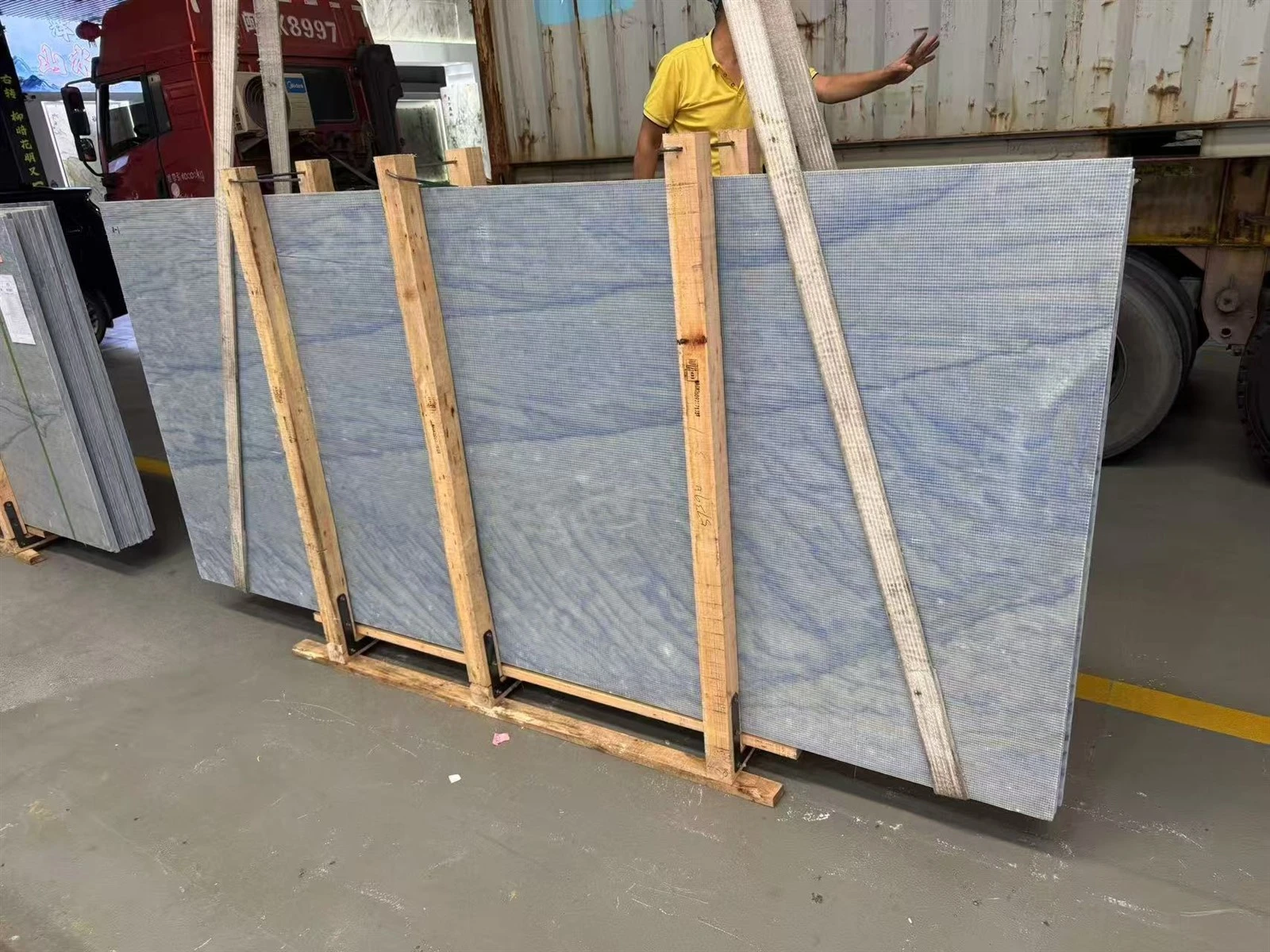 Azul Macaubas Quartzite slabs secured in a timber support frame for export packing. Azul Macaubas Quartzite slabs secured in a timber support frame for export packing.