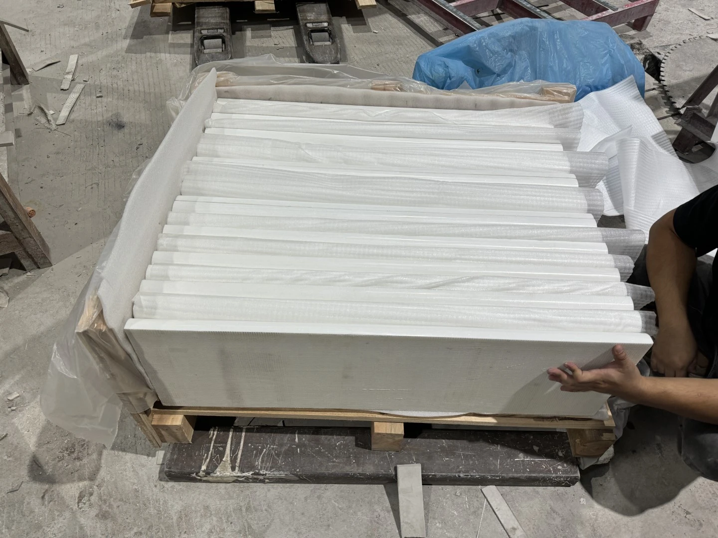 Thassos White Marble pool coping pieces individually separated with protective foam inside an export crate. Thassos White Marble pool coping pieces individually separated with protective foam inside an export crate.
