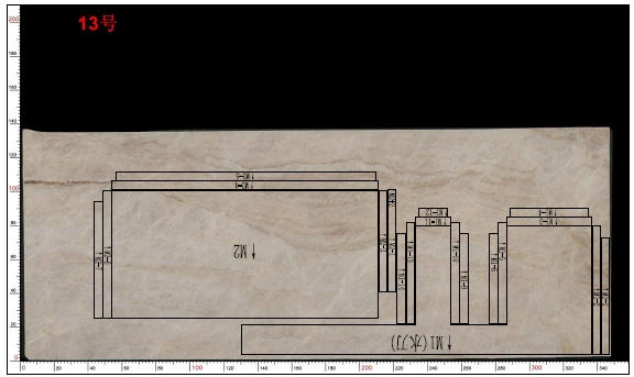 AutoCAD cutting layout placing countertop panels over a scanned Taj Mahal Quartzite slab image to control material yield and vein positioning. AutoCAD cutting layout placing countertop panels over a scanned Taj Mahal Quartzite slab image to control material yield and vein positioning.