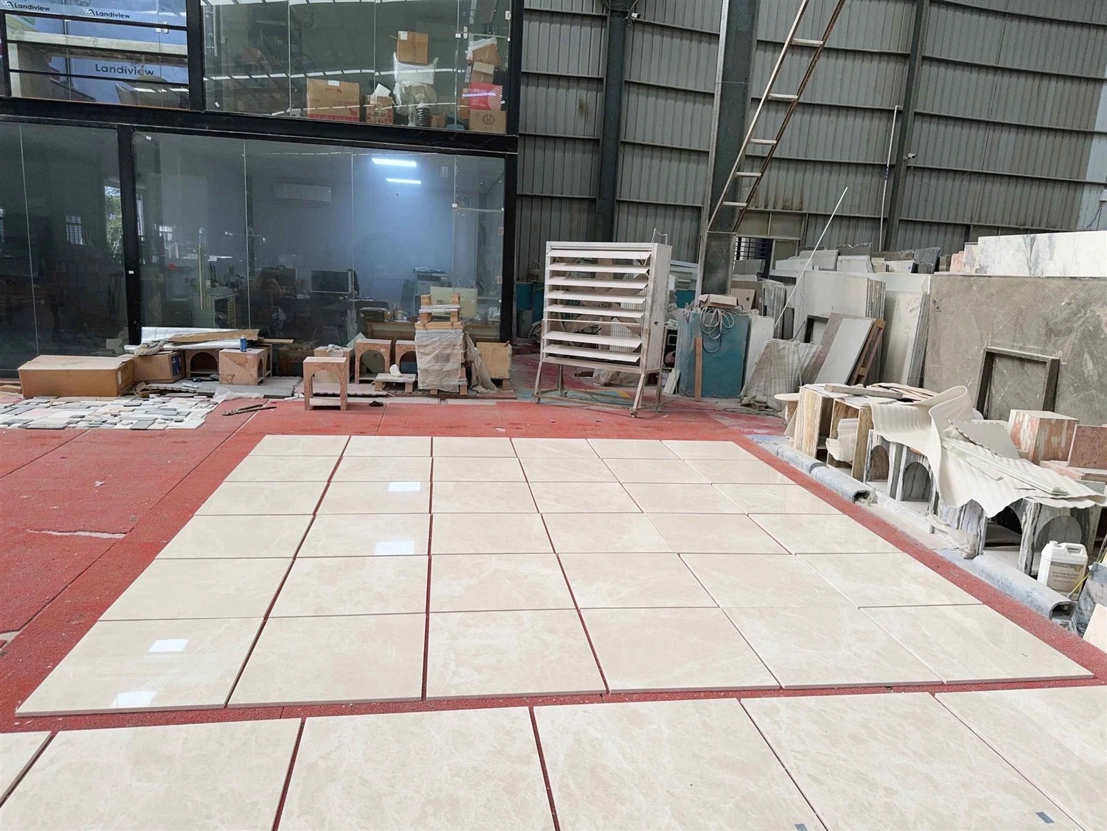 Elevation K showing polished Aran White Marble wall tiles arranged in the factory for layout and appearance review. Elevation K showing polished Aran White Marble wall tiles arranged in the factory for layout and appearance review.