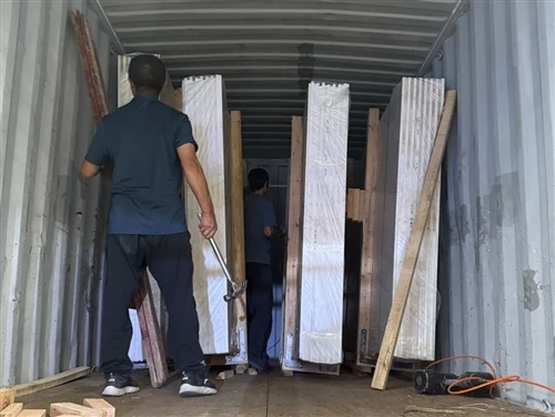 14 Bundles Of Book-Matched Guangxi White Marble Slabs Shipped To Indonesia