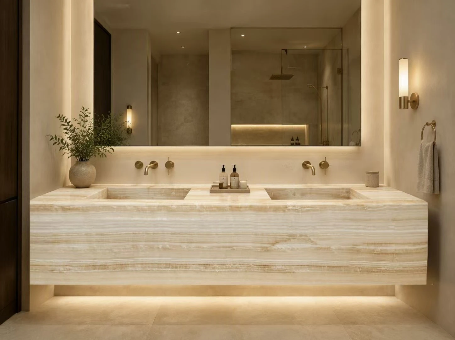 Vanilla Onyx bathroom vanity with double integrated sinks and mitered edges in a luxury custom home Vanilla Onyx bathroom vanity with double integrated sinks and mitered edges in a luxury custom home