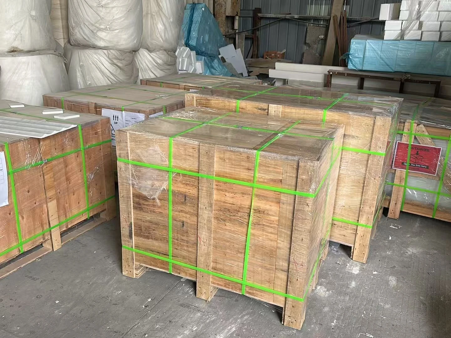 Solid-wood export crates secured with straps and waterproof wrapping for Taj Mahal Quartzite long fluted tiles Solid-wood export crates secured with straps and waterproof wrapping for Taj Mahal Quartzite long fluted tiles