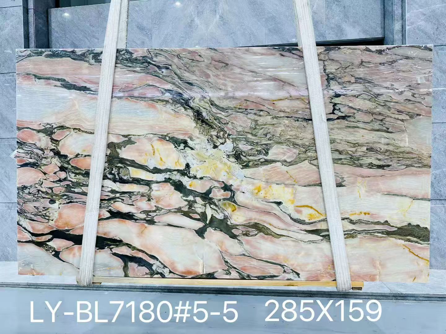 Polished Calacatta Viola Rosa Marble slab with a soft pink background and dramatic black, gray and golden veining Polished Calacatta Viola Rosa Marble slab with a soft pink background and dramatic black, gray and golden veining
