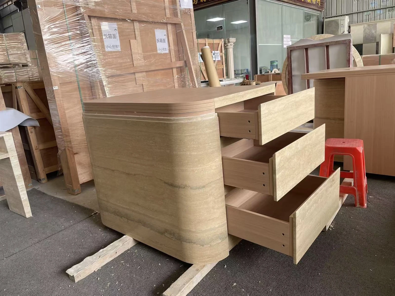 Left cabinet module wrapped with honed-and-filled Silver Travertine panels and fitted stone drawer fronts. Left cabinet module wrapped with honed-and-filled Silver Travertine panels and fitted stone drawer fronts.